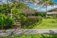 Tropical Gardens and Resort Amenities - Charming Coastal Escape Hotels near Nounou-East Trail