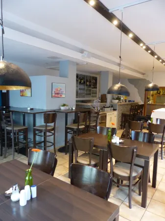 Hotel Pension Köberl Отели в г. Грефельфинг