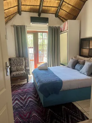 Serene Thatched Roof Retreat in Faerie Glen, Pretoria