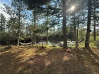 Charming 2-bedroom cabin with WiFi, AC near ATV routes, & Rock Dam Lake.