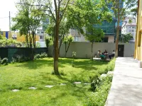 โรงแรม กรีน การ์เดน โรงแรมใกล้สนาม Polyvalent Hall