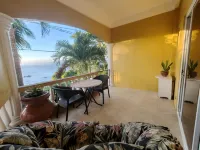 studio apartment with ocean views and swimming pool .