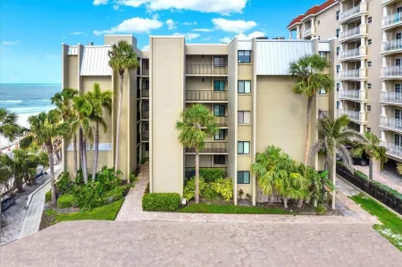 The Shores, updated Beach Front Condo, balcony with direct Gulf view, pool.