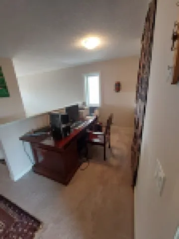 Quiet house and neighborhood well located 25 minutes from Calgary.