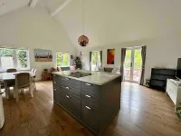 Beautiful modern barn conversion with south facing secluded patios and garden.