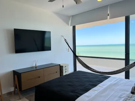 Luxury beachfront condo w/private jacuzzi
