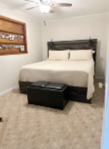 3-bedroom cabin nestled on 80 acres with WiFi, AC on private 5-acre lake.