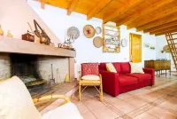 Cottage surrounded by greenery ideal for families