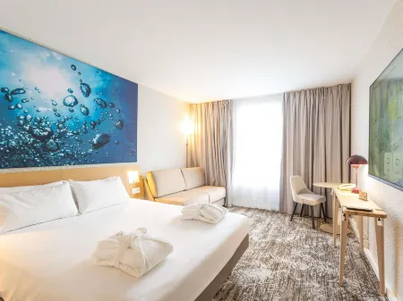 Novotel Grenoble Nord Voreppe Отели в г. Ла Сюр ан Шартрёз