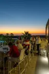 Oceanfront ground level condo on a Private Beach in a lovely resort!