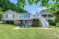 Lakefront Retreat With a Large Yard, Stone Fire Pit, Gazebo, Deck, & Dock - 4-Star
