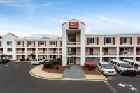Studios & Suites 4 Less Charlotte Отели в г. Шарлотт