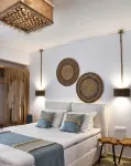 Angelos Design Suites Hotels in Votsi