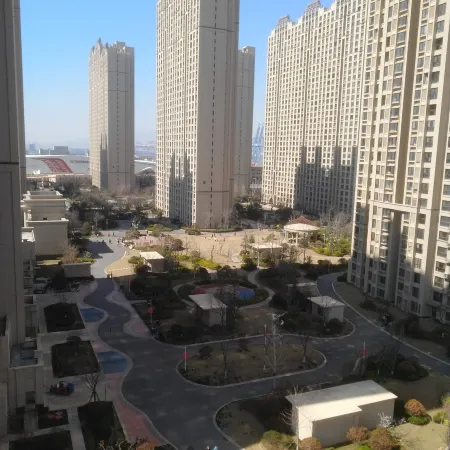 Yiju Xiaojia Apartment (Hanjing Road No.1) Отели рядом с достопримечательностью «Китайская медицинская больница в новом районе западного побережья Циндао»