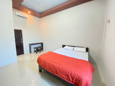 Kanaan Guesthouse RedPartner Wanea 호텔