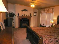 Location!  Nice log home in dark sky community next to several peaks