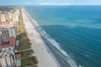 New Listing!  Ground Floor, Elegant 2 Bedroom Condo minutes from the beach.