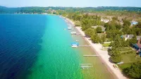 Second floor unit close to downtown Beulah & Crystal Lake for year-round fun! - 4-Star