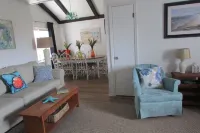 Just steps to the beach, bar, and playground park!