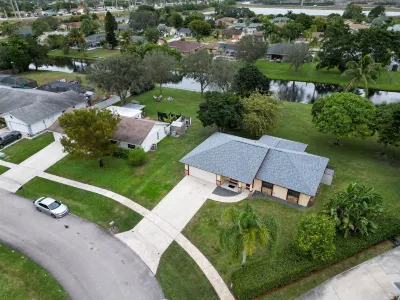 Modern Oasis: Tranquil Living in Royal Palm Beach Hotels near Publix Super Market at The Groves at Royal Palms