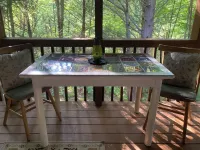 Creek-side cottage in secluded mountain setting, centrally located, easy access.