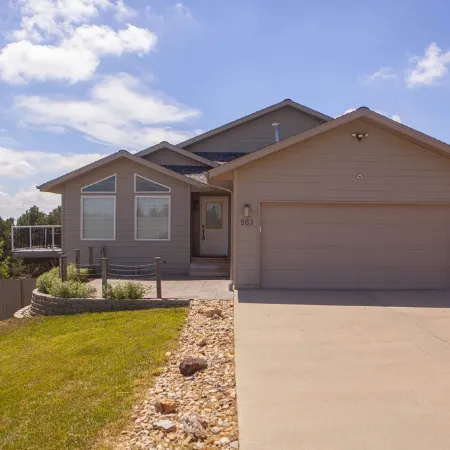 Immaculate modern home with stunning views nestled into a beautiful valley.