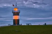 Cozy vacation apartment with dike view in Wremen Hotels in Wurster Nordseekuste