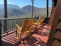 Enjoy the beautiful view of the mountains in your private hot tub!  Pet friendly