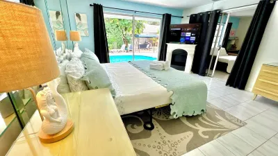 Swim with Butterflies! Garden, Heated Pool 1mi to Beach 4 Bed 3 Bath Sleeps 10