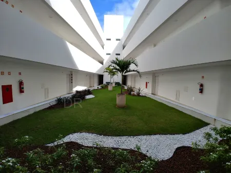 Areias do Mar | 2 Quartos Garden Familia A113 Отели в г. Barra de Sao Miguel