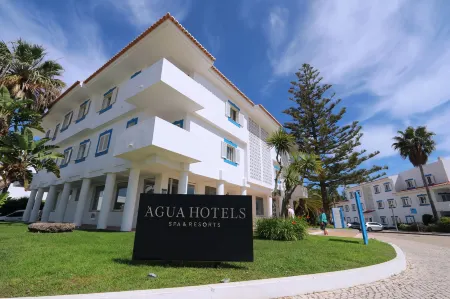 Agua Hotels Vila Branca Отели рядом с достопримечательностью «Ponta da Piedade Lighthouse»