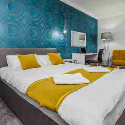 Apartamenty Homely Place Center Rooms