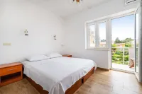 Room in Guest Room - Cozy Room Near Beach L Hotels in Novalja