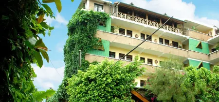 Kindoroko Hotel Отели в г. Моши