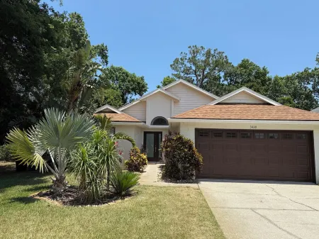 Close to beach! Family-sized home with pool and hot tub.