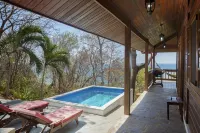 Stunning Beach House with ocean views and 5 minute walk to private beach!