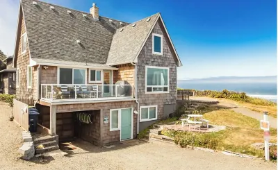 Beautifully renovated 4 bedroom beach front home! w/stairsto beach   Pets-ok!