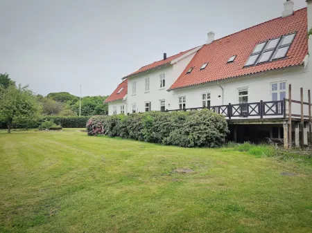 Aamølle Gæstgiveri Отели в г. Мариагер-фьорд