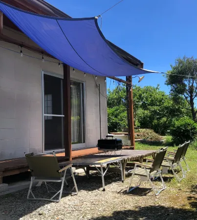 Guest House Hibiscus Отели рядом с достопримечательностью «Mount Yonaha»