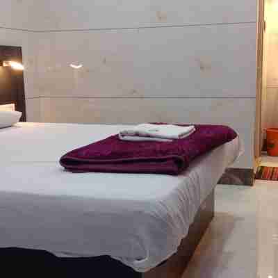 Thrivikrama Lodge Rooms