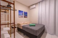 Flats Mar'Bella Com Varanda Para Relaxar e Praia Para Curtir, Garagem Privado e ArCond - homestay