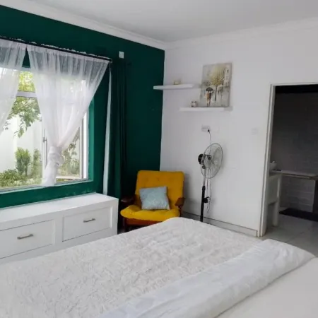 A Cozy Selfcatering Apartment, 5Min dr to the Center and 7Mins to the Rainforest