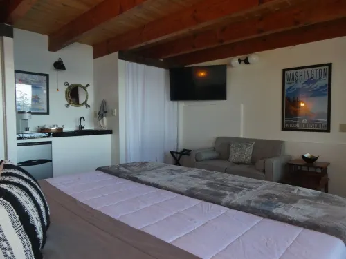 Experience the PNW in a cabin on Hood Canal with water and mountain views.