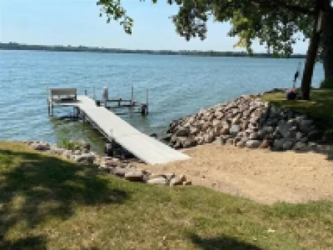 Year round cabin on level lot with dock