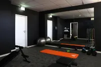 JustStay München Hotel & Apartments - salle de sport