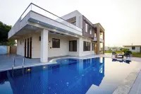 ELIVAAS Lush Haven 4BHK Villa Pvt Pool -  case vacanza in affitto