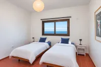 GuestReady - Beachfront Bungalow Sunsets -  Privatzimmer