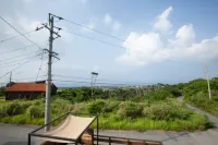 Roof Balcony with BBQ and Jacuzzi Projector Equi Hotels in Nakijin
