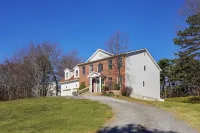 Spacious 6-bedroom Pocono Home with Hot Tub, Game and Theater rooms, Fire Pit!