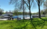 2-bedroom house on Strawberry Lake in Pinckney, MI with hot tub, WiFi.